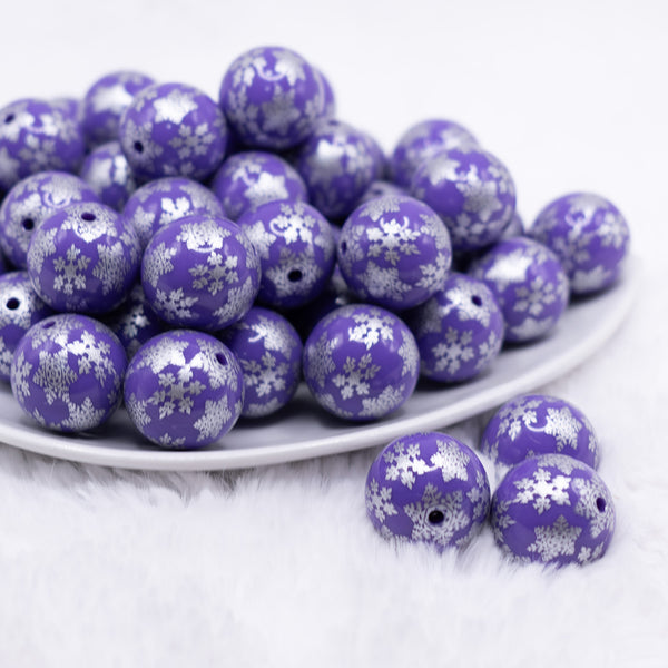 front view of a pile of 20mm Purple with Silver Snowflake Print Bubblegum Beads