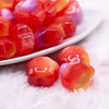 macro view of a pile of 20mm Red Opal Flower Shaped Acrylic Beads