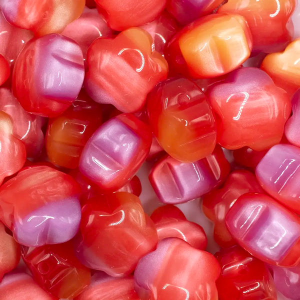 close up view of a pile of 20mm Red Opal Flower Shaped Acrylic Beads