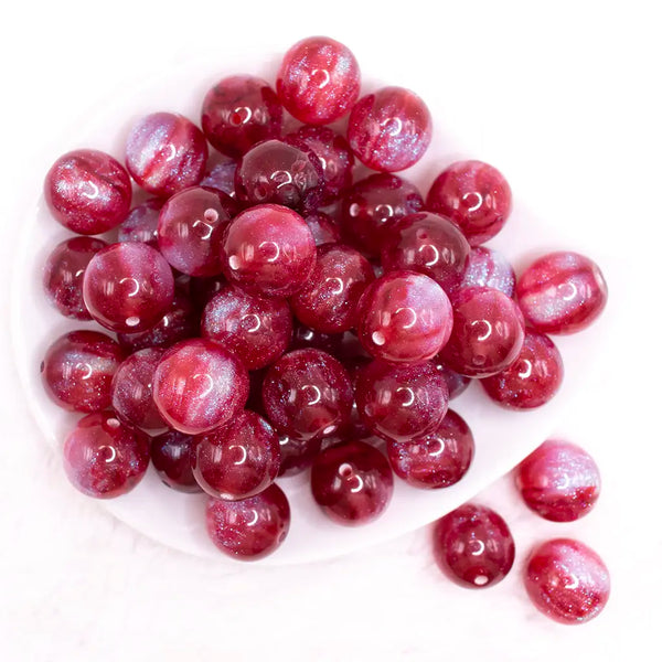 top view of a pile of 20mm Red Opalescence Bubblegum Bead