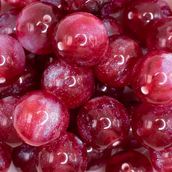 close up view of a pile of 20mm Red Opalescence Bubblegum Bead