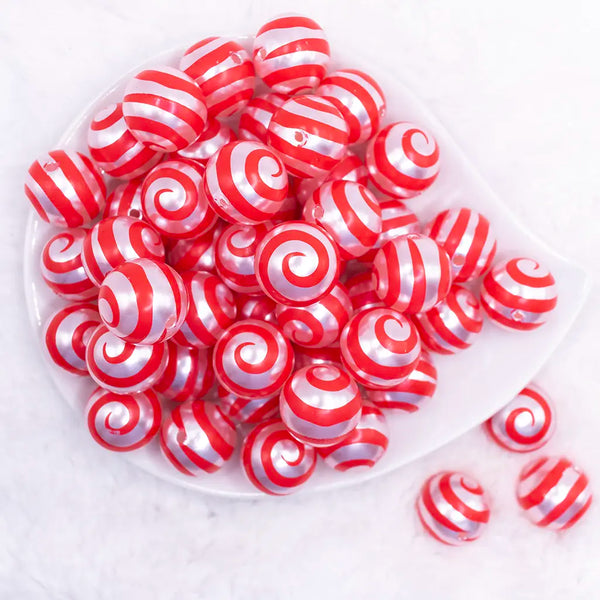 top view of a pile of 20mm Red Swirl on White Pearl Bubblegum Beads