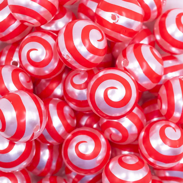 close up view of a pile of 20mm Red Swirl on White Pearl Bubblegum Beads