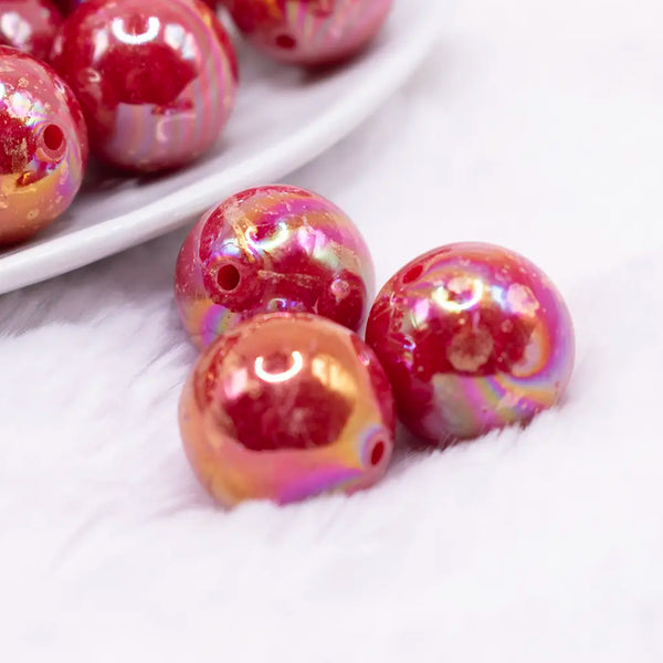 macro view of a 20MM Red with Gold Foil AB Bubblegum Beads