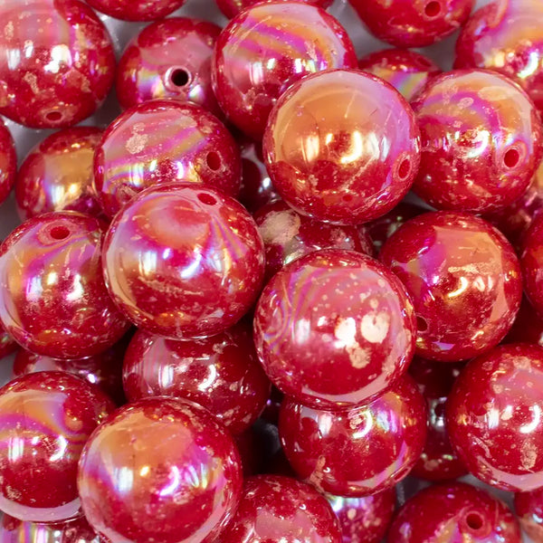 close up view of a 20MM Red with Gold Foil AB Bubblegum Beads