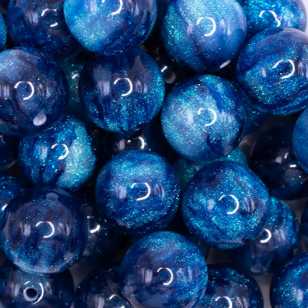 close up view of a pile of 20mm Royal Blue Opalescence Bubblegum Bead