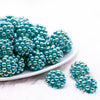front view of a pile of 20mm Teal Green Berry Rhinestone Bubblegum Beads