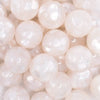 close up view of a pile of 20mm White Heart Glitter Shimmer Bubblegum Bead