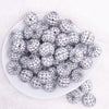 top view of a pile of 20mm White with Black Spider Web Rhinestone Bubblegum Beads