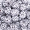 close up view of a pile of 20mm White with Black Spider Web Rhinestone Bubblegum Beads
