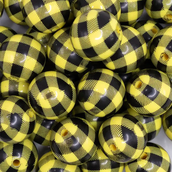 close up view of a pile of 20mm Yellow with Black Plaid Print Acrylic Bubblegum Beads