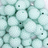 close up view of a pile of 20mm Aqua Blue Rhinestone Bubblegum Beads