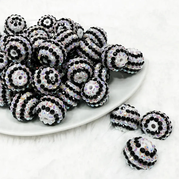 front view of a pile of 20mm Black and White Striped Rhinestone Bubblegum Beads