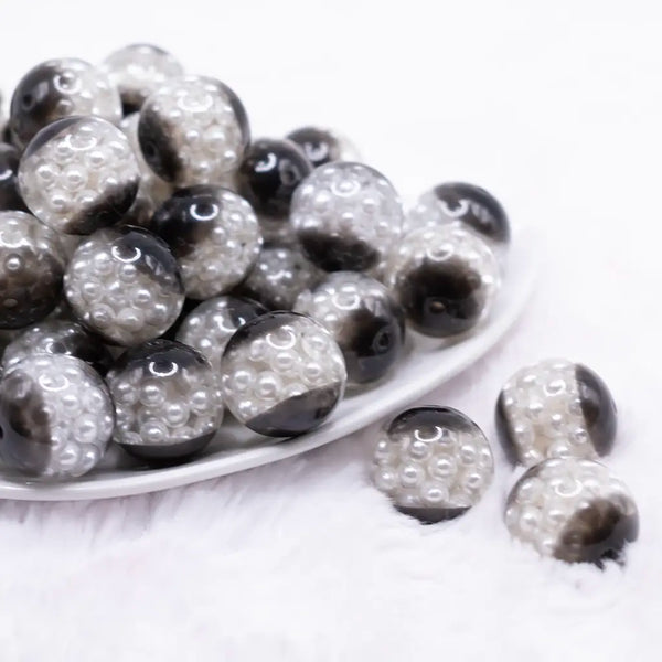 front view of a pile of 20mm Black Captured Pearls Bubblegum Bead