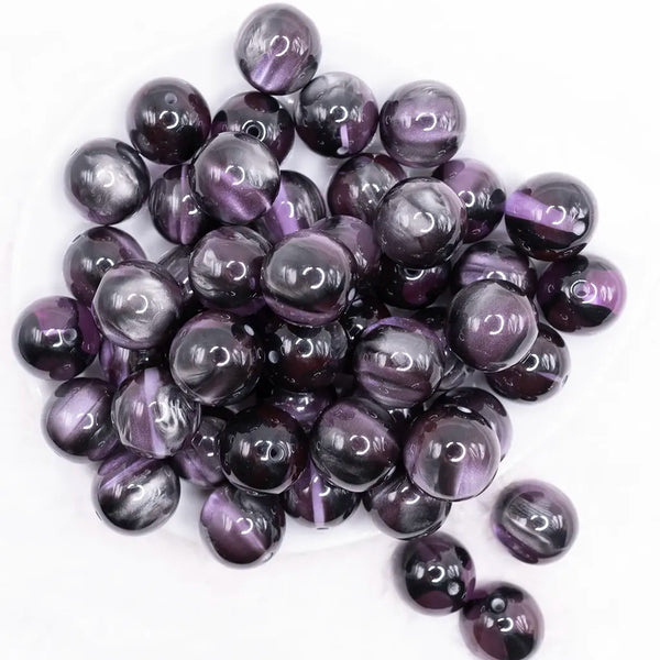 top view of a pile of 20mm Black Illusion Glitter Bubblegum Bead