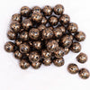 top view of a pile of 20mm Black with Gold Filigree Printed Acrylic Bubblegum Beads
