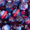 close up view of a pile of 20mm Blue and Red Illusion Glitter Bubblegum Bead