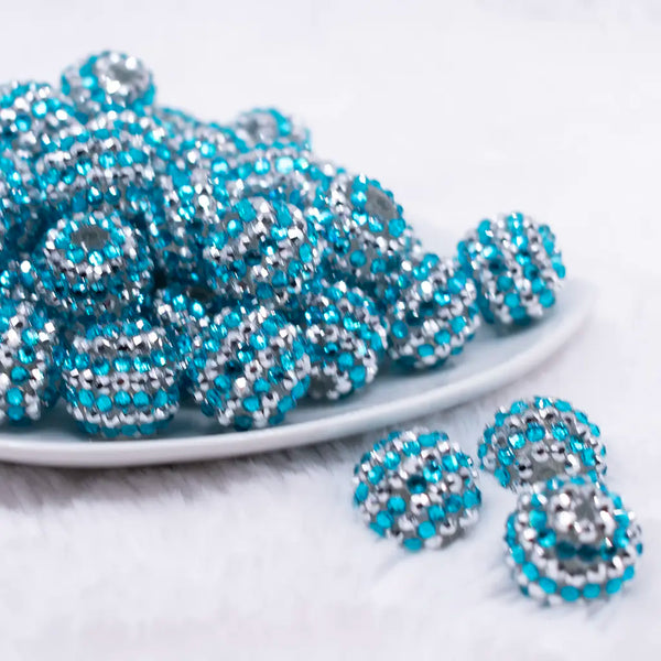 front view of a  pile of 20mm Blue and Silver Striped AB Rhinestone Bubblegum Beads