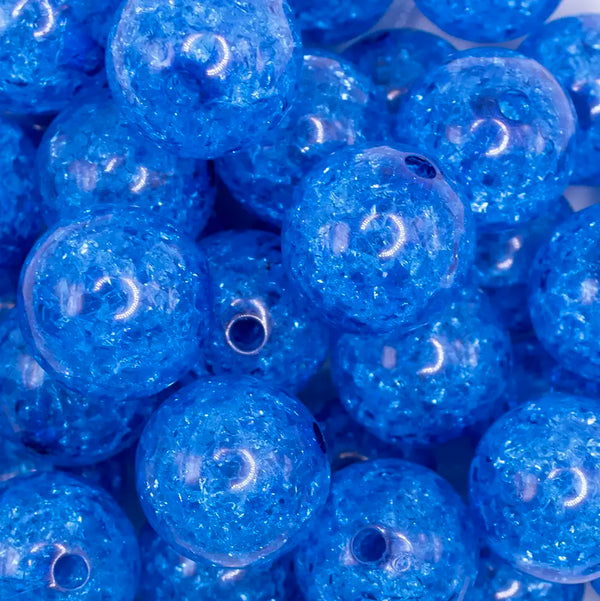 close up view of a pile of 20mm Cobalt Blue Crackle Bubblegum Beads