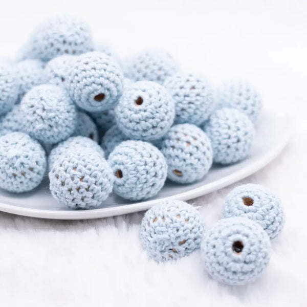 front view of a pile of 20mm Blue Crochet wooden bead