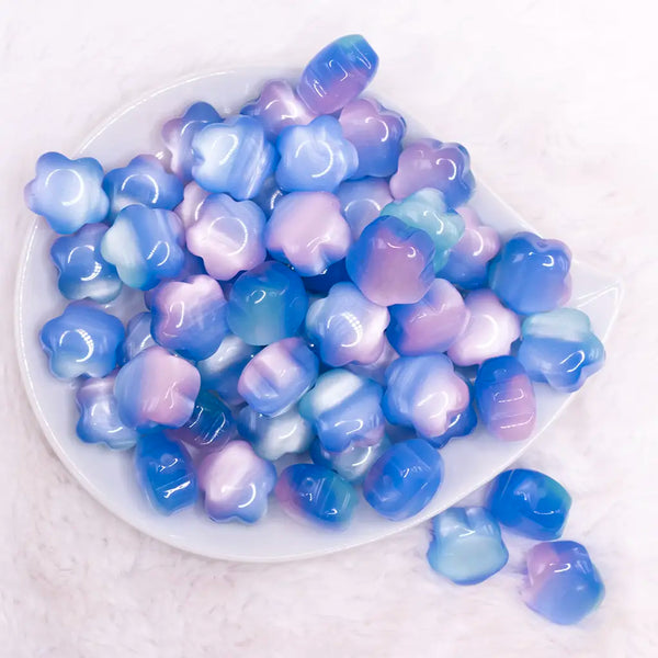 top view of a pile of 20mm Blue Opal Flower Shaped Acrylic Beads