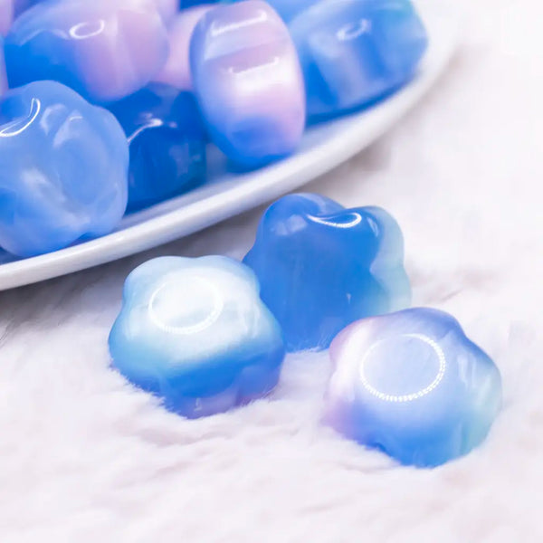 macro view of a pile of 20mm Blue Opal Flower Shaped Acrylic Beads