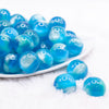 front view of a pile of 20mm Blue Illusion Glitter Bubblegum Bead