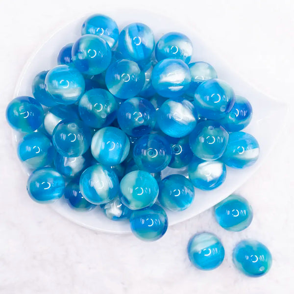 top view of a pile of 20mm Blue Illusion Glitter Bubblegum Bead