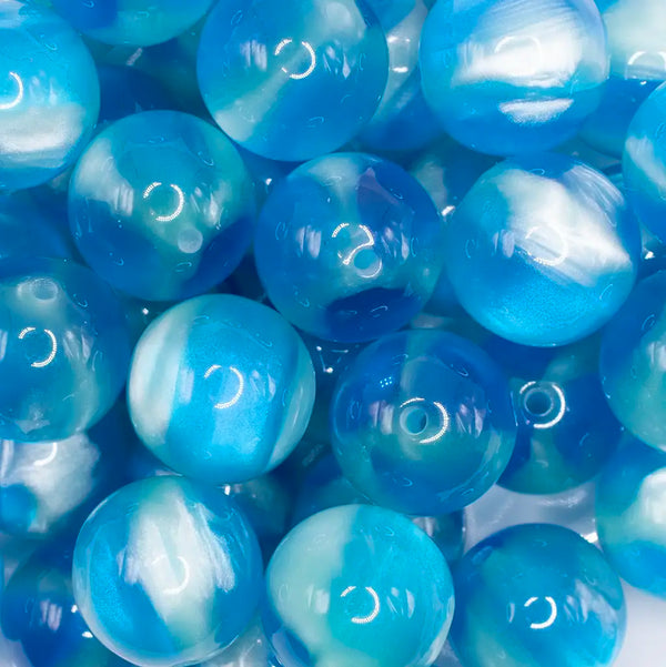 close up view of a pile of 20mm Blue Illusion Glitter Bubblegum Bead