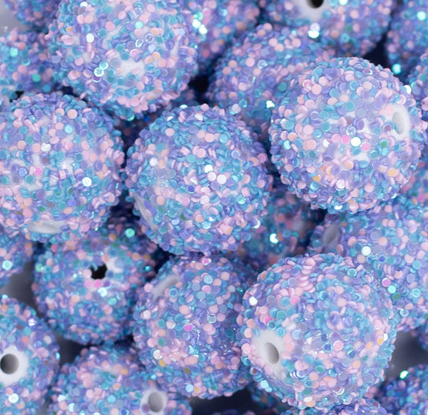 close up view of a pile of 20mm Purple and Blue Sequin Confetti Bubblegum Beads