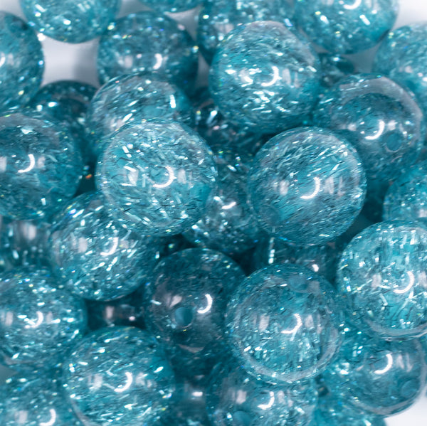 close up view of a pile of 20mm Blue Glitter Tinsel Bubblegum Beads