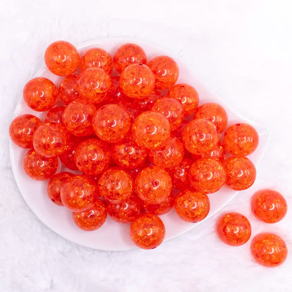 top view of a pile of 20mm Bright Orange Crackle Bubblegum Beads
