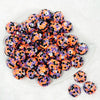 top view of a pile of 20mm Bright Orange, Purple and Black Confetti Rhinestone Bubblegum Beads