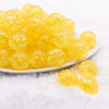 front view of a pile of 20mm Bright Yellow Crackle Bubblegum Beads