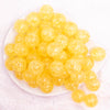 top view of a pile of 20mm Bright Yellow Crackle Bubblegum Beads