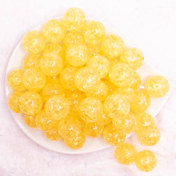 top view of a pile of 20mm Bright Yellow Crackle Bubblegum Beads