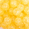 close up view of a pile of 20mm Bright Yellow Crackle Bubblegum Beads