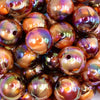 close up view of a pile of 20mm Brown / Orange Marbled Bubblegum Beads