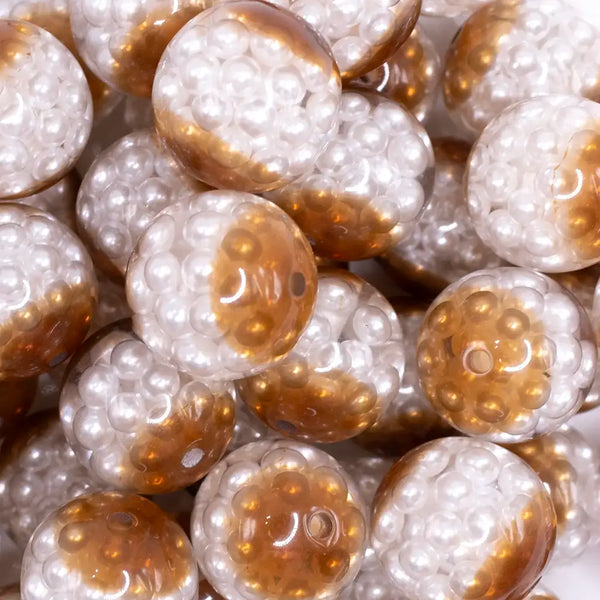 close up view of a pile of 20mm Brown Captured Pearls Bubblegum Bead