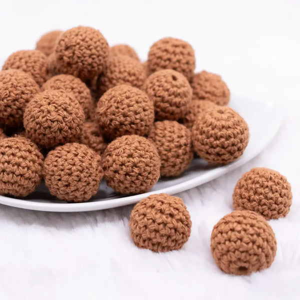 front view of a pile of 20mm Brown Crochet wooden bead