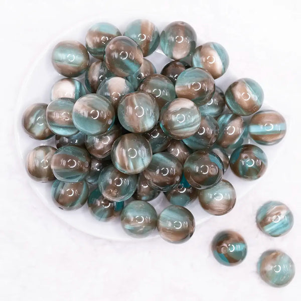 top view of a pile of 20mm Greenish Brown Illusion Glitter Bubblegum Bead