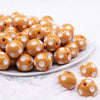 front view of a pile of 20mm Caramel with White Polka Dots Acrylic Bubblegum Beads