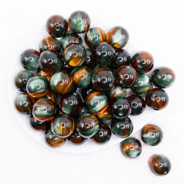 top view of a pile of 20mm Cats Eye Illusion Glitter Bubblegum Bead