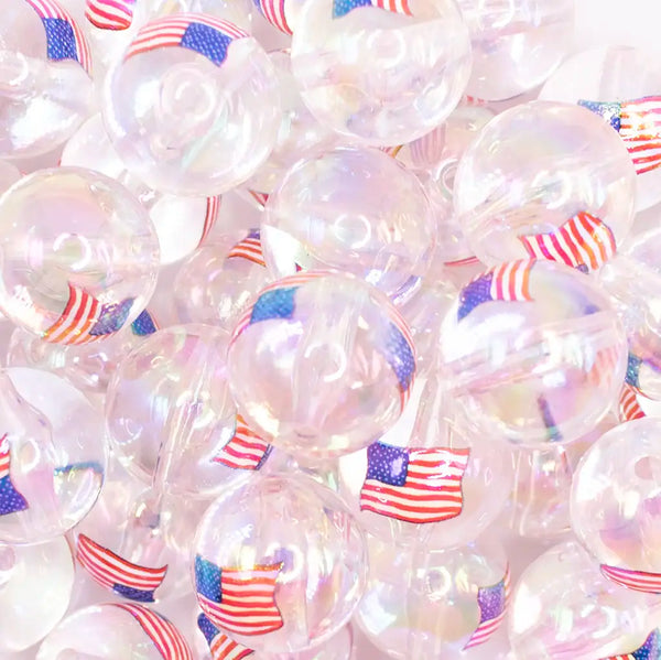 zoomed view of a pile of 20mm Flag Print on Clear Acrylic Bubblegum Beads