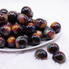 front view of a pile of 20mm Brown Colorful Marbled Bubblegum Beads