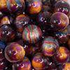 close up view of a pile of 20mm Brown Colorful Marbled Bubblegum Beads