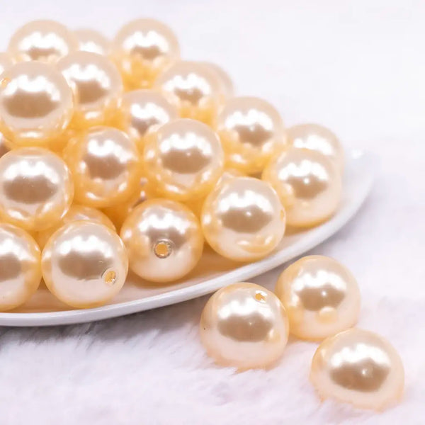 front view of a pile of 20mm Cream Faux Pearl Bubblegum Beads
