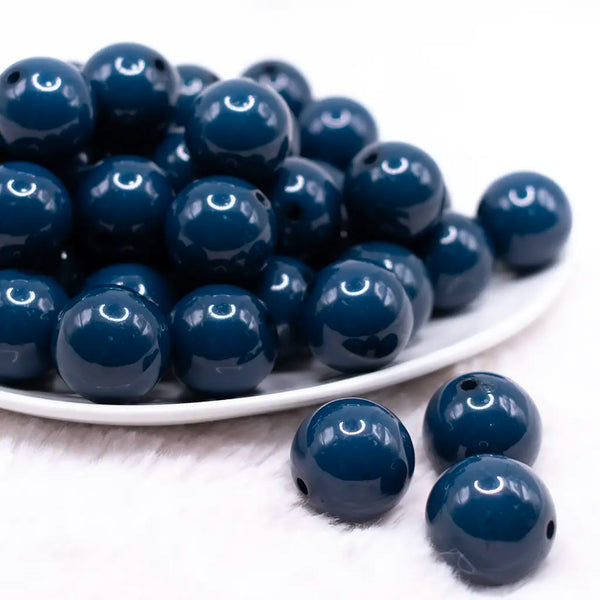 front view of a pile of 20mm Denim Blue Solid Bubblegum Beads