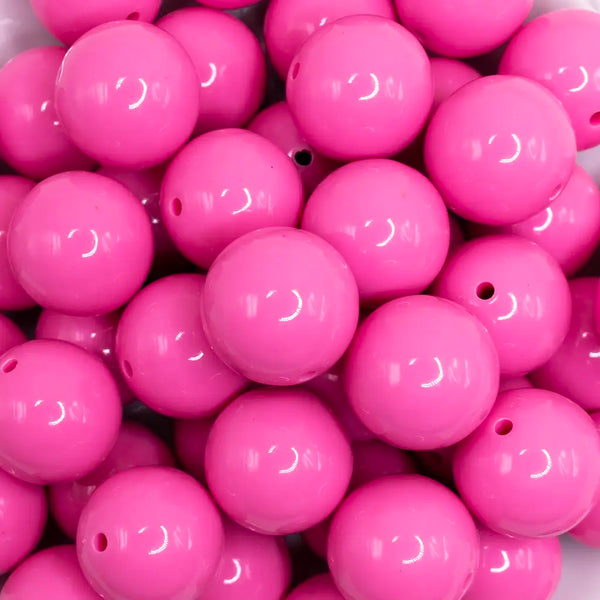 close up view of a pile of 20mm Dusty Pink Solid Bubblegum Beads