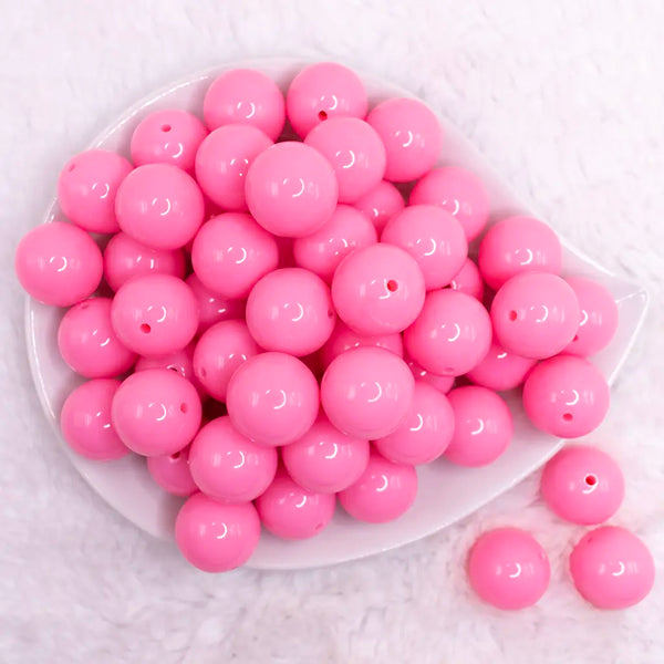 top view of a pile of 20mm Flamingo Pink Solid Bubblegum Beads